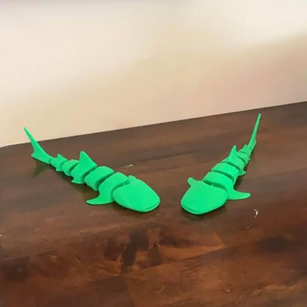 2 green 3D printed whale sharks